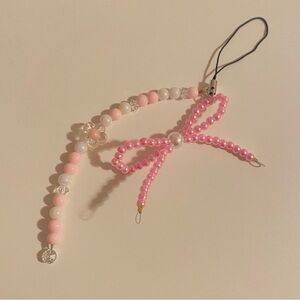 Pink and white beaded bow key chain